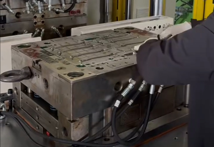 Case Study: Automotive Door Check Arm Molding Solution