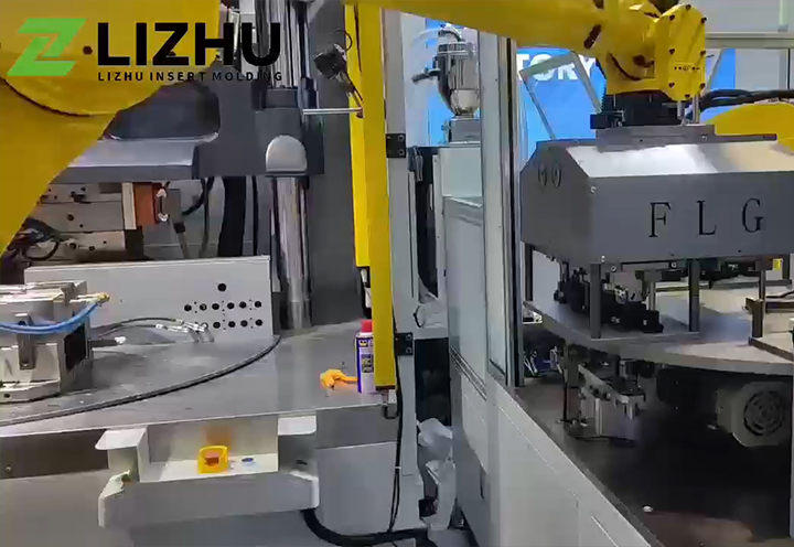 LIZHU Vertical Injection Molding Machine Works with Automation for Improved Injection Molding Efficiency