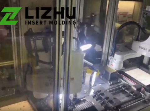 LIZHU Vertical Injection Molding Machine Integrates with Automation for Efficient Precision Plastic Part Production
